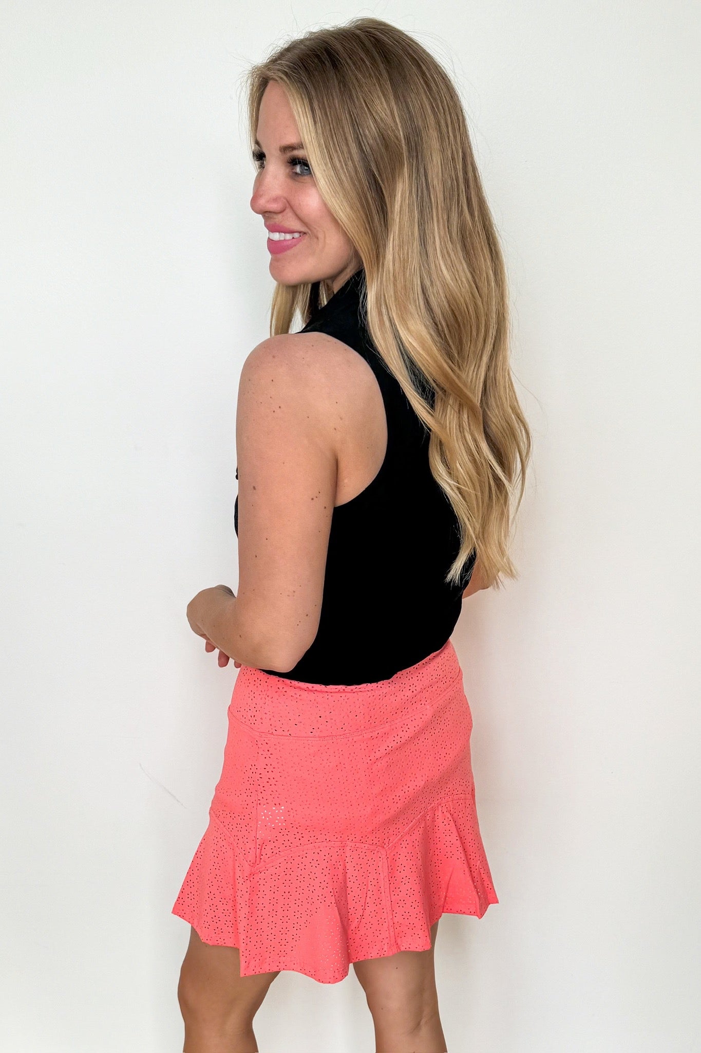 The Rosario Eyelet Pocketed Fit and Flare Skort in Coral