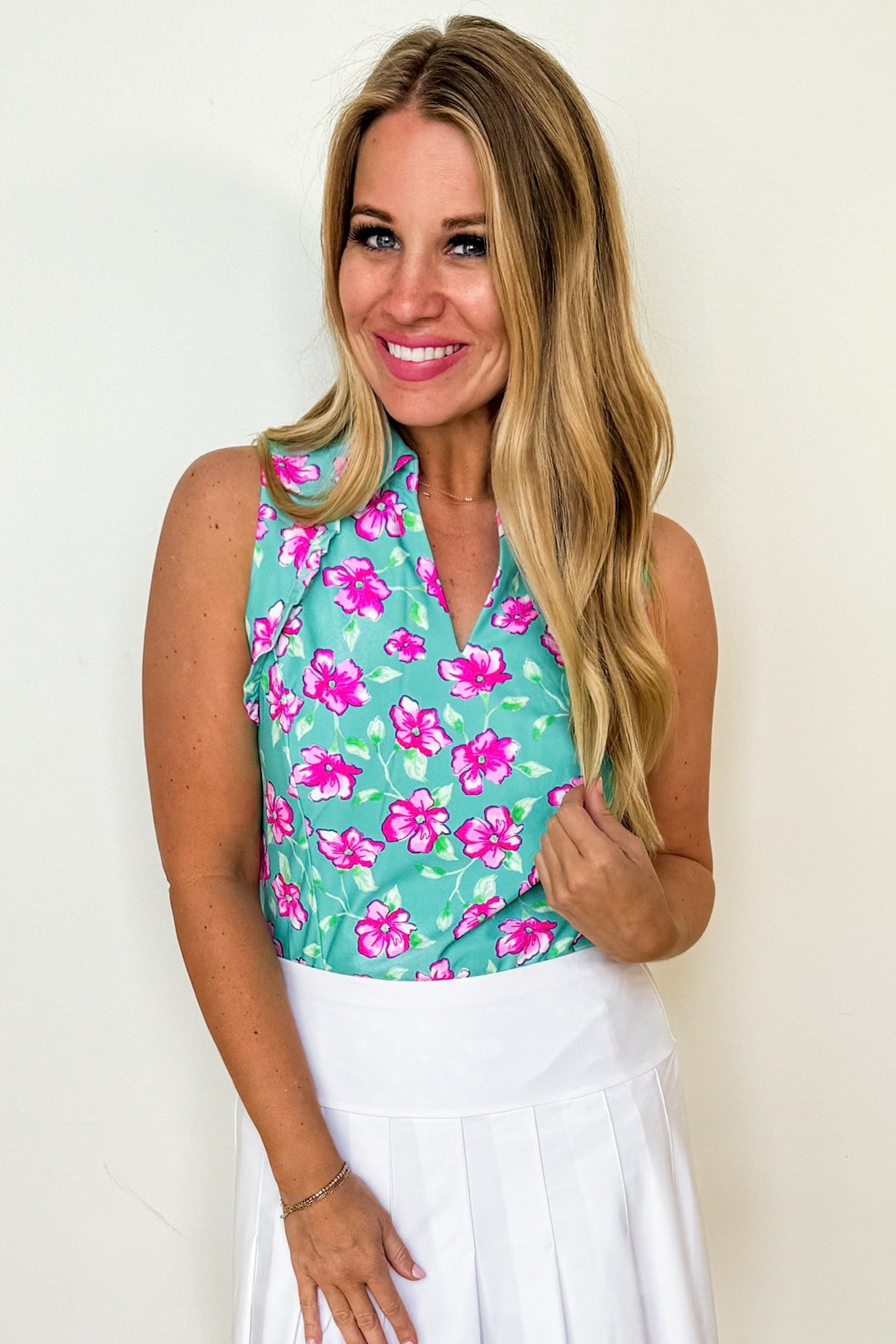 The Genesis Ruffle Polo Tank Top in Mint & Pink Floral