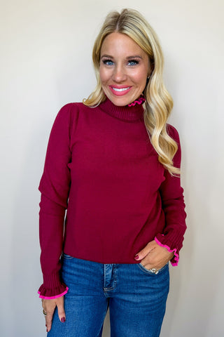 Raspberry Ruffle Sweater