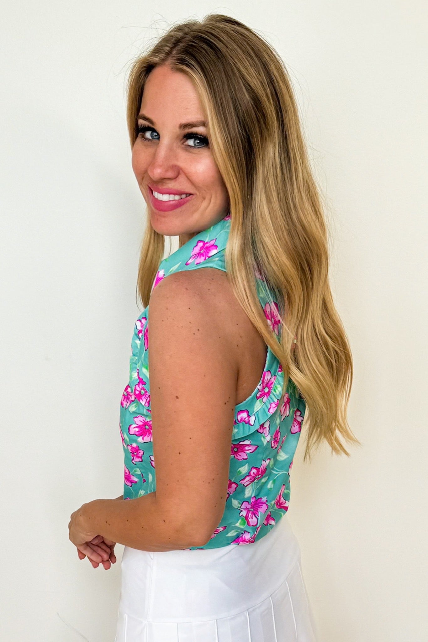 The Genesis Ruffle Polo Tank Top in Mint & Pink Floral