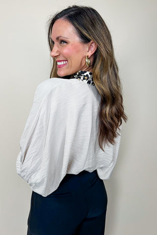 The Sarah Cheetah Print V Neck Top In Cream