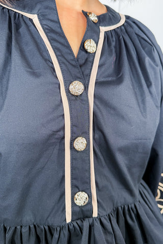 She Means Business Black Peplum Top with Tan Embroidered Details