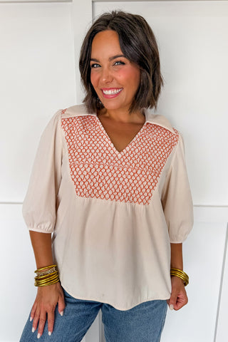 The Collared V-neck Smocked Embroidered Top in Cream