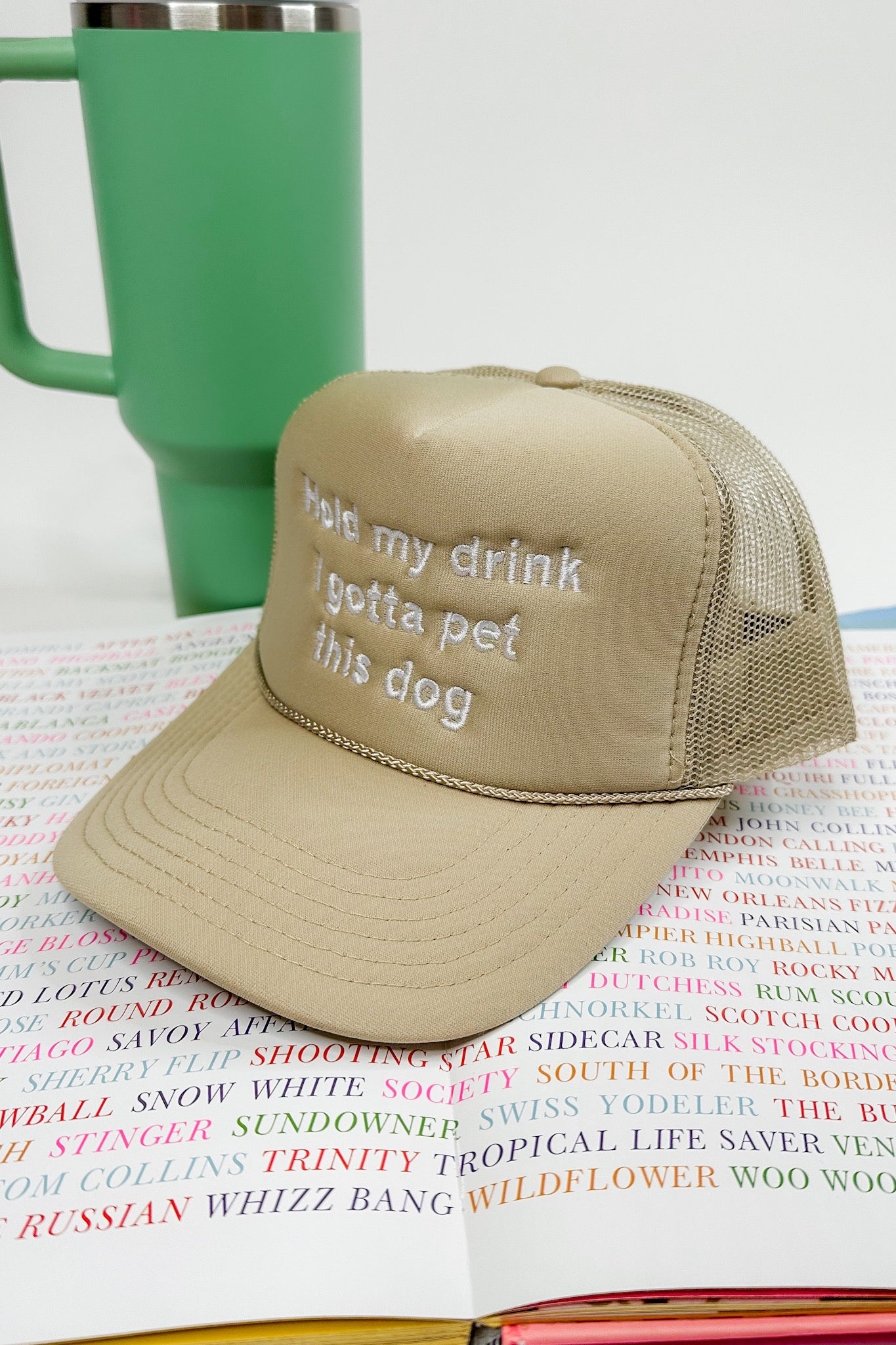 Hold My Drink I Gotta Pet This Dog Embroidered Tan Trucker Hat