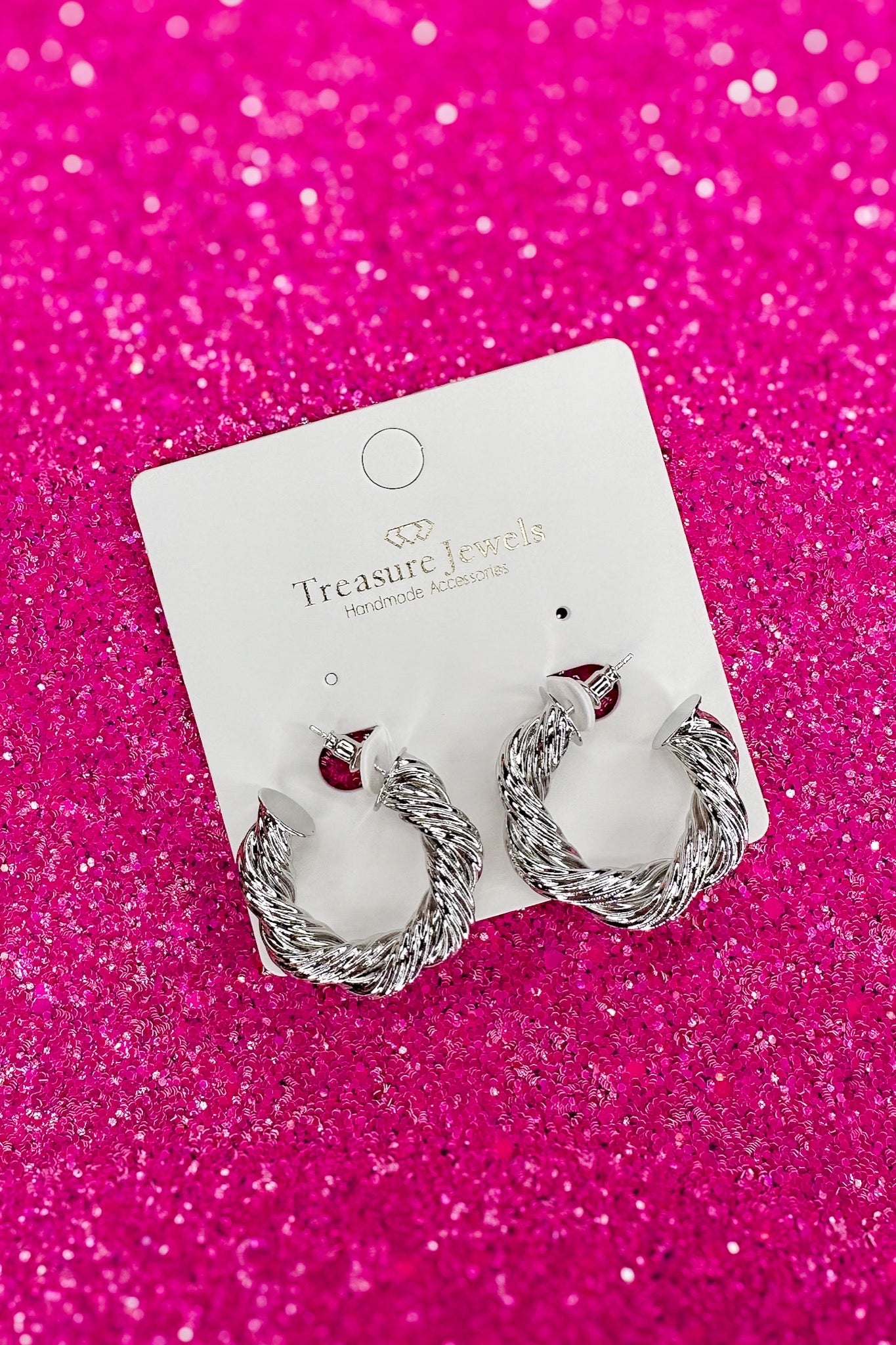 Jennifer Twisted Hoop Earring in Silver by Treasure Jewels