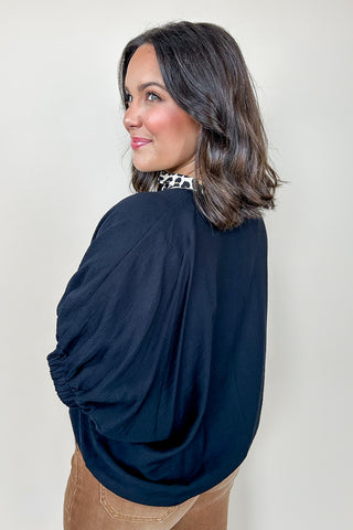 The Sarah Cheetah Print V Neck Top In Black