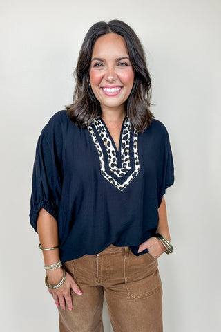 The Sarah Cheetah Print V Neck Top In Black