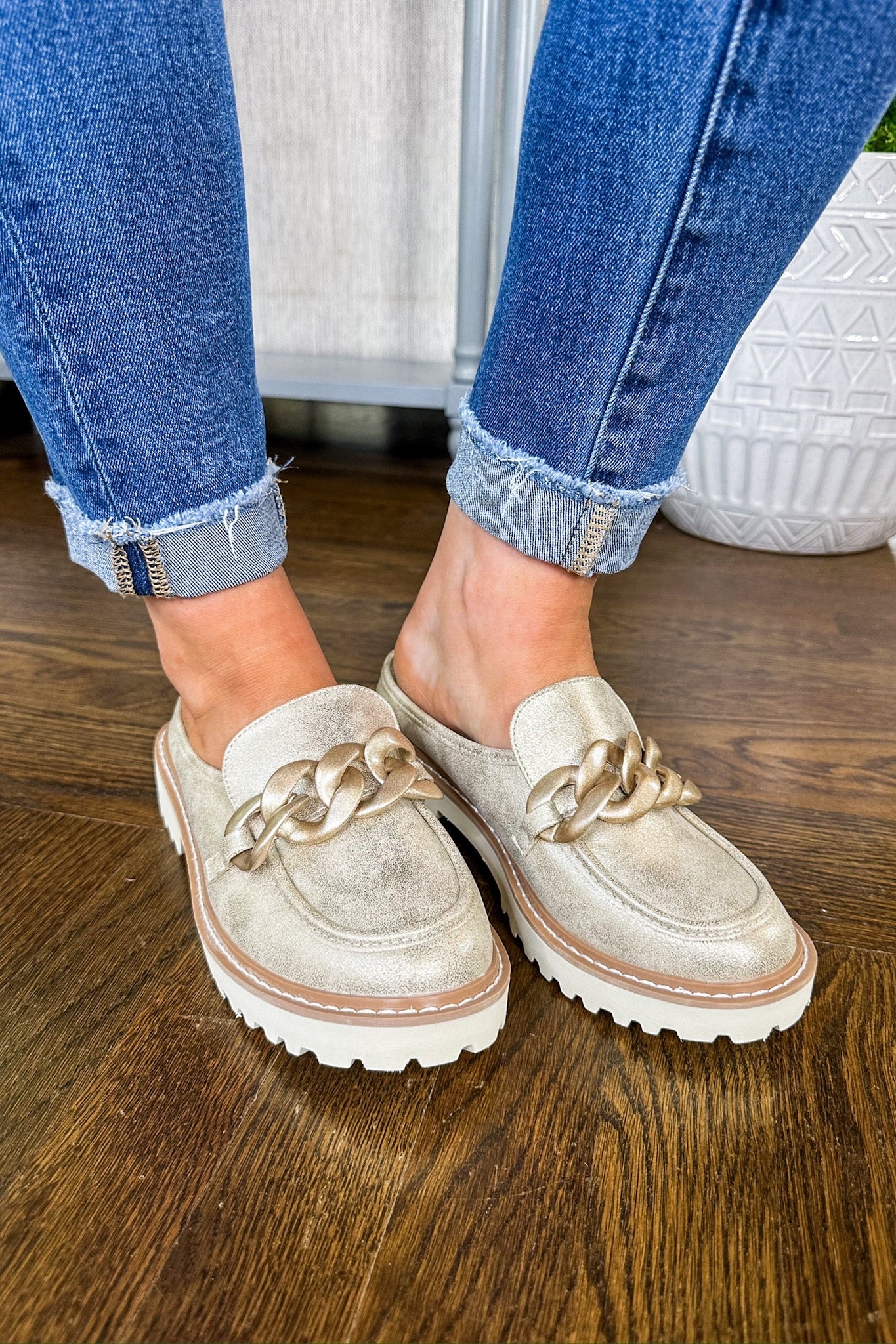 The Mora Suede Chunky Chain Backless Lug Sole Loafer in Gold