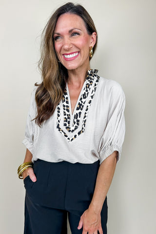 The Sarah Cheetah Print V Neck Top In Cream