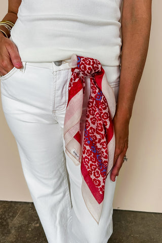 Risen Raw Hem Mid Rise White Flare Jean