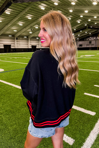 The Millie Football Sweatshirt in Red/black Footballs by Mary Square