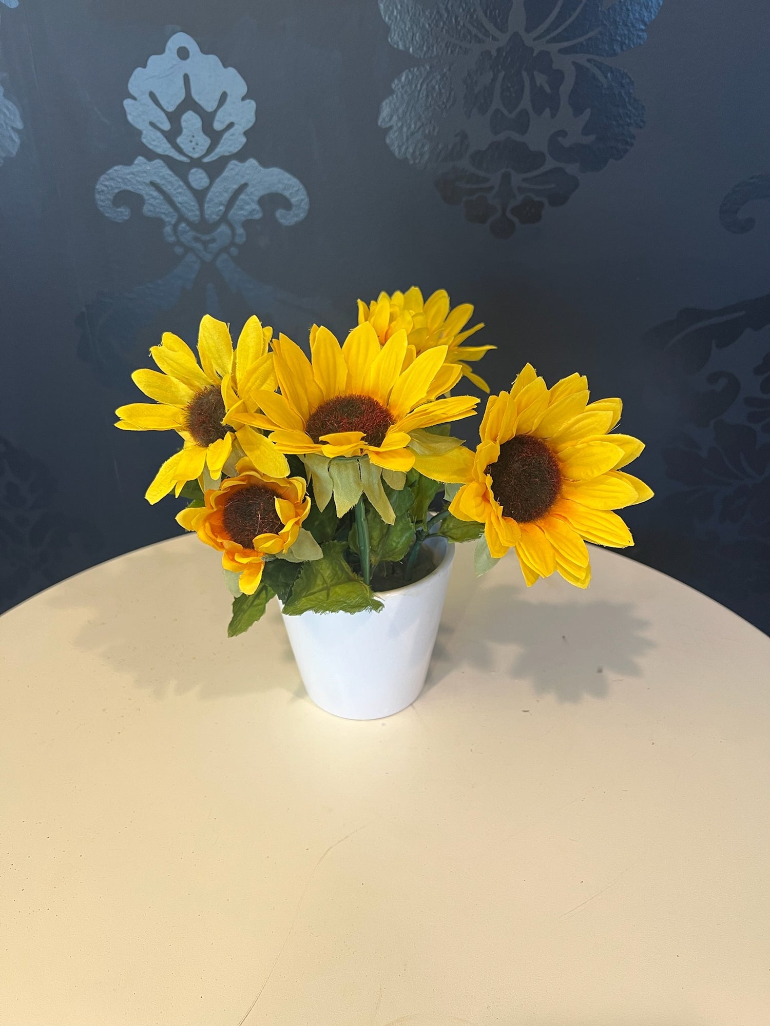 Sunflowers in White Planter