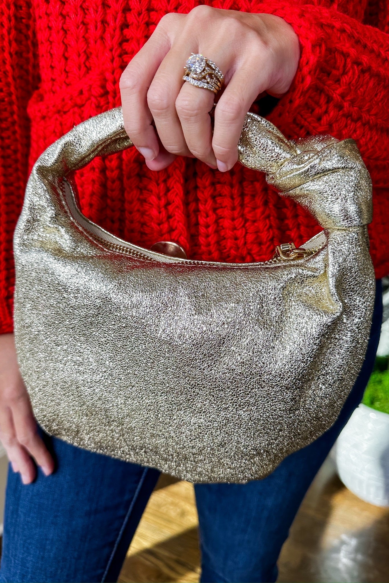 The Chrissy Knotted Top Handle Metallic Bag in Gold