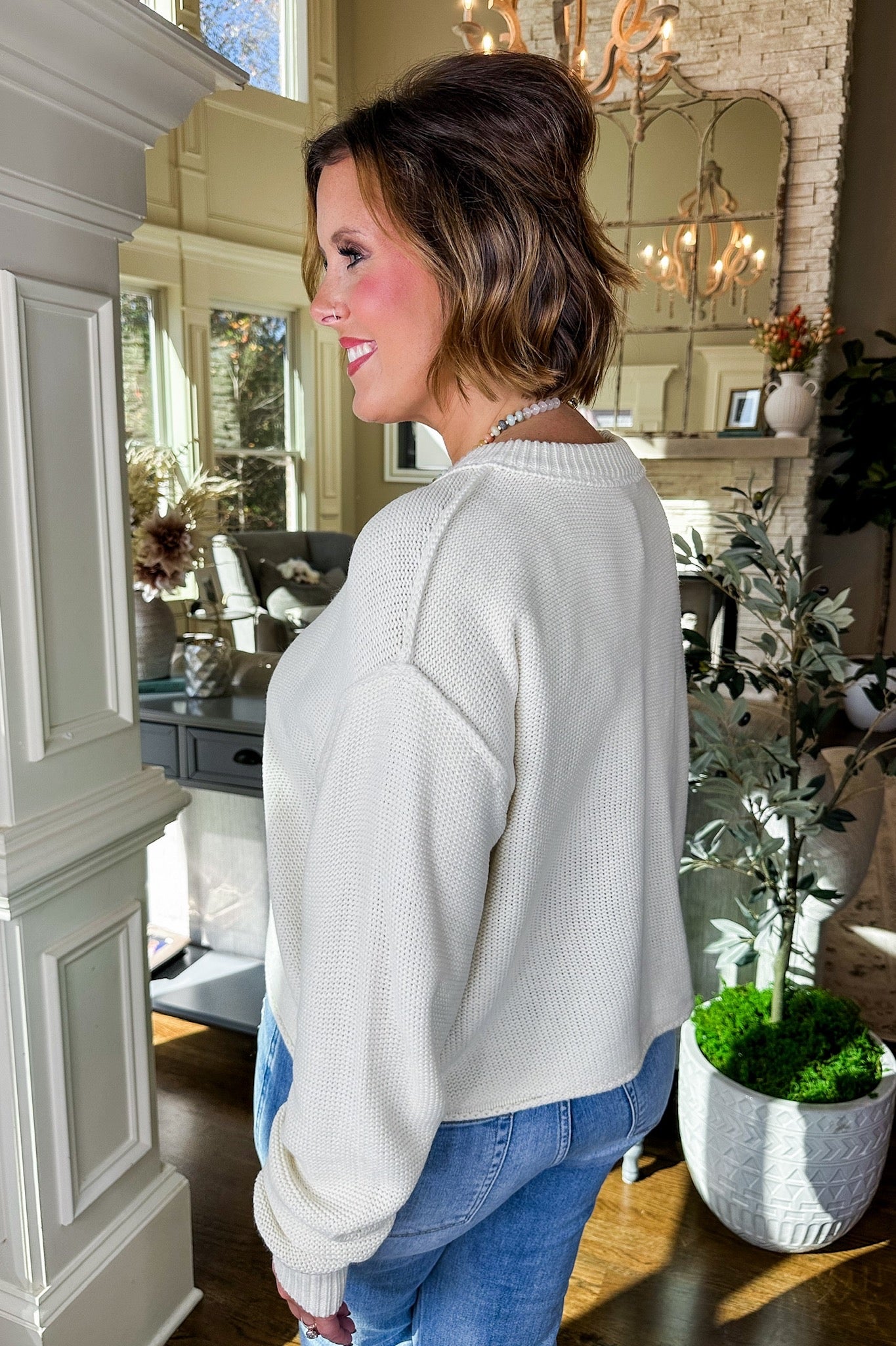 Exposed Seam Rolled Hem Classic Knit Sweater in Cream