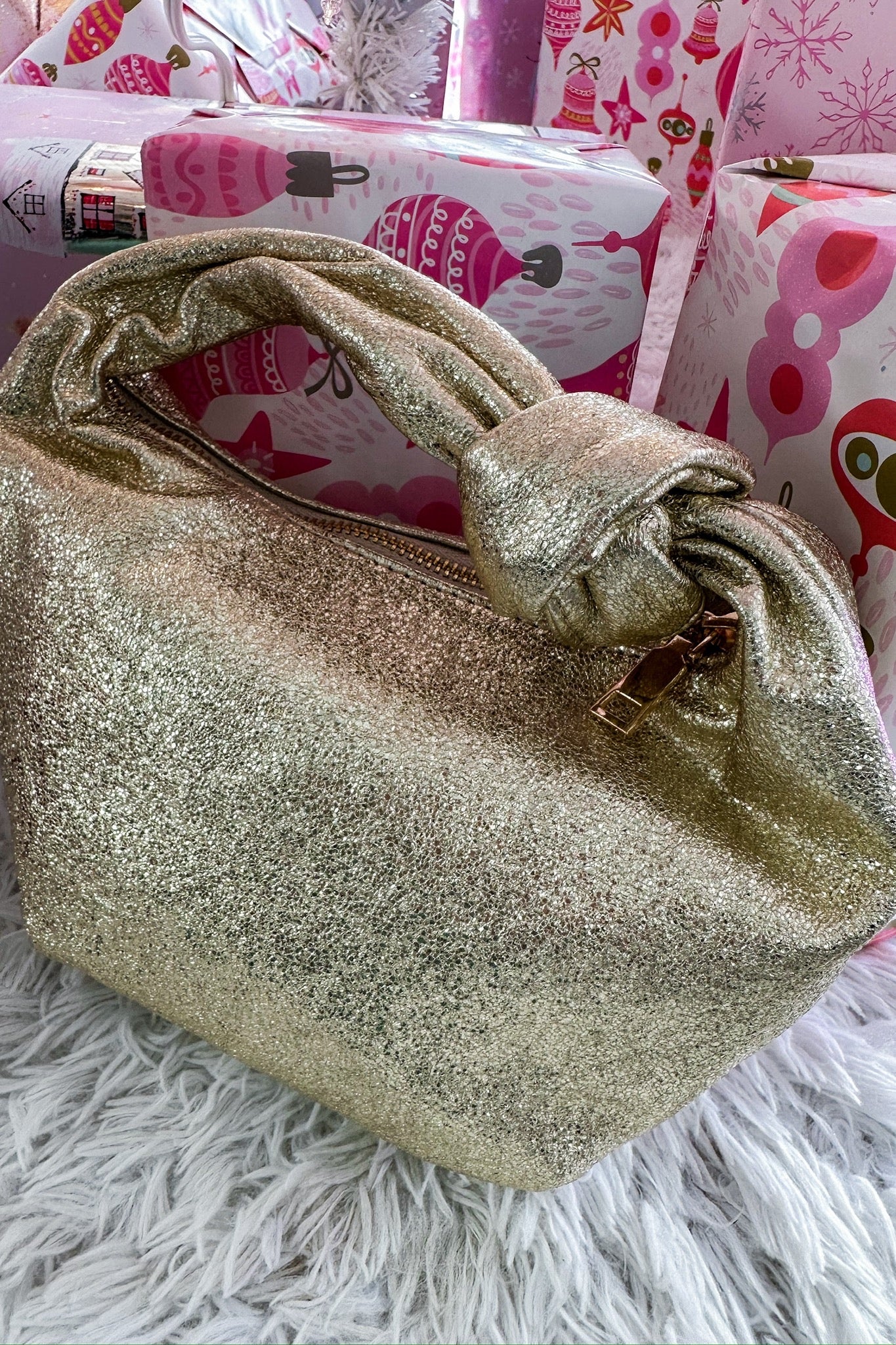 The Chrissy Knotted Top Handle Metallic Bag in Gold