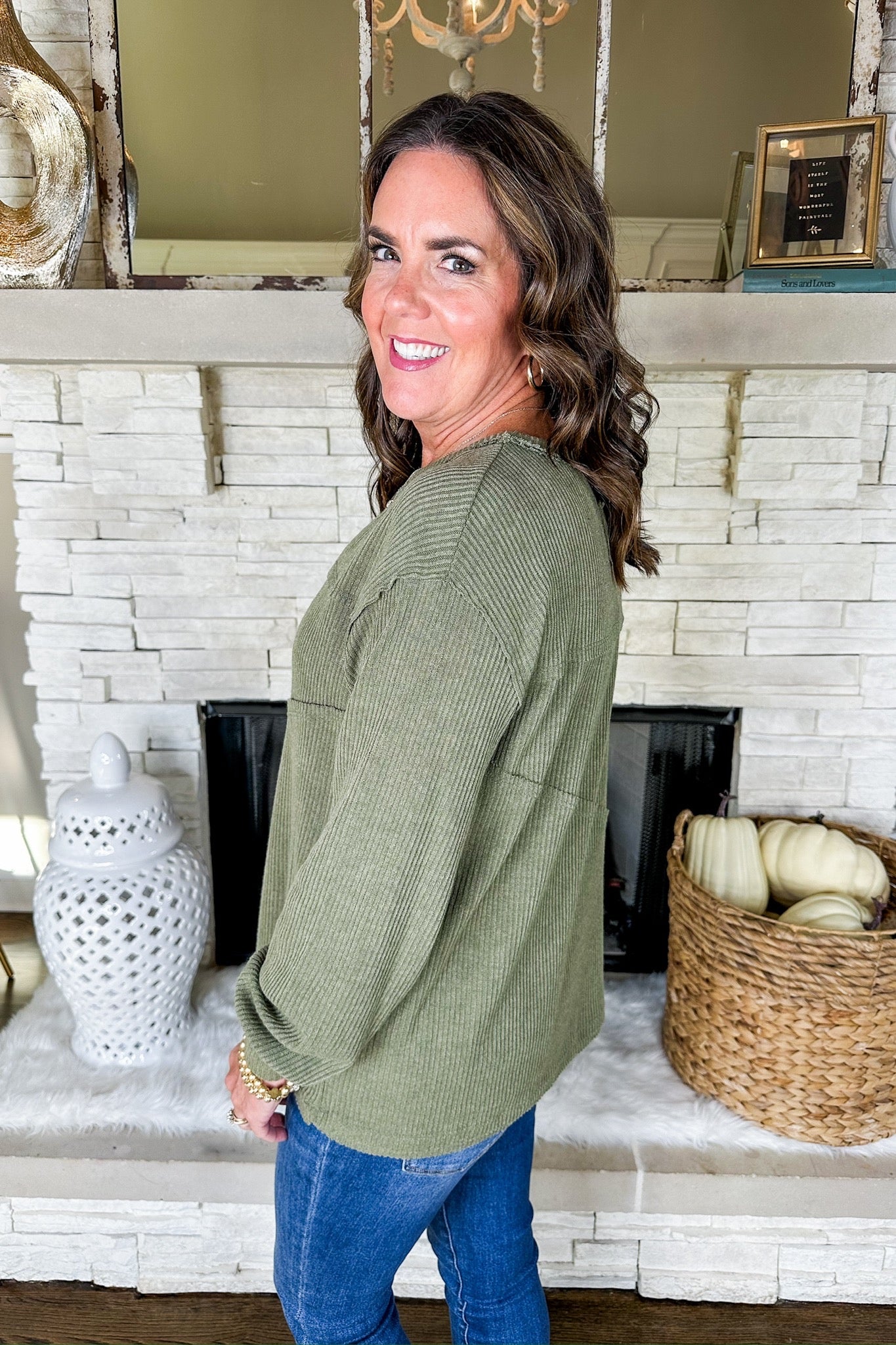 The Saige Asymmetrical Exposed Seam Ribbed Top in Olive